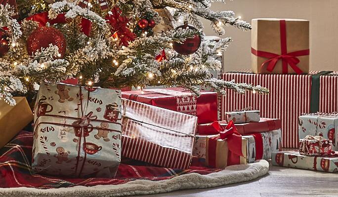Christmas gifts wrapped in the CANVAS Red Wrapping collection.