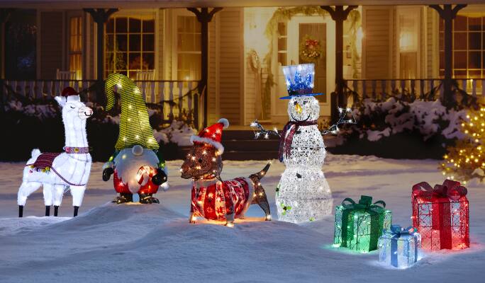 CANVAS Whimsical Collection displayed on a snowy front lawn.