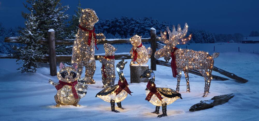 Canvas Canadian Cabin collection of bears, beaver, geese and moose pre-lit wire figures.