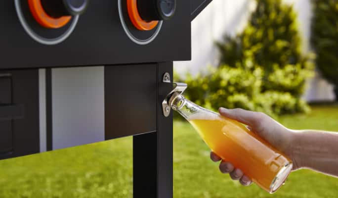 MASTER Chef® Grill Turismo 4-Burner Griddle bottle opener, opening orange soda. 