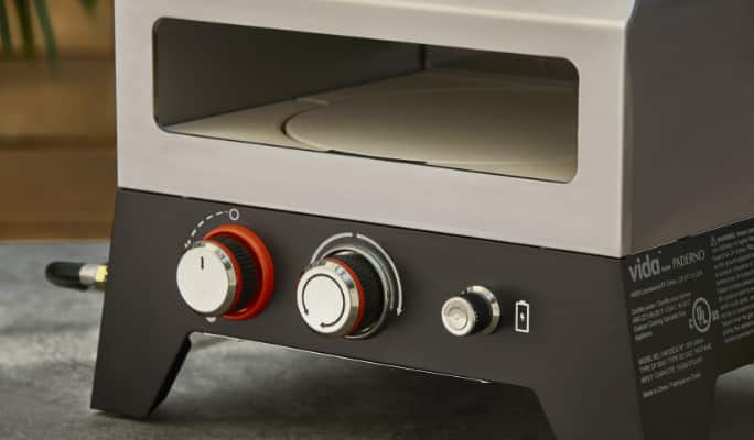 Close up of Vida by PADERNO Gas Pizza Oven dials.