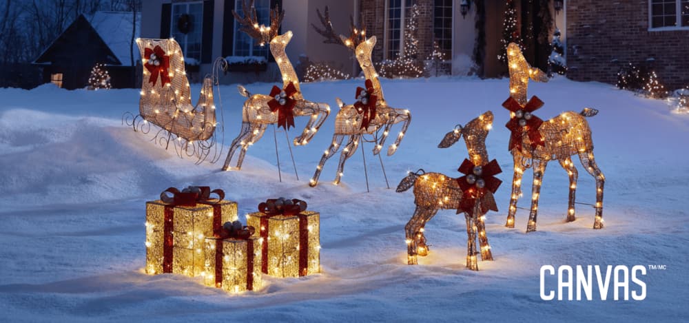 A snowy lawn decorated with CANVAS Golden Charm wireform figures.