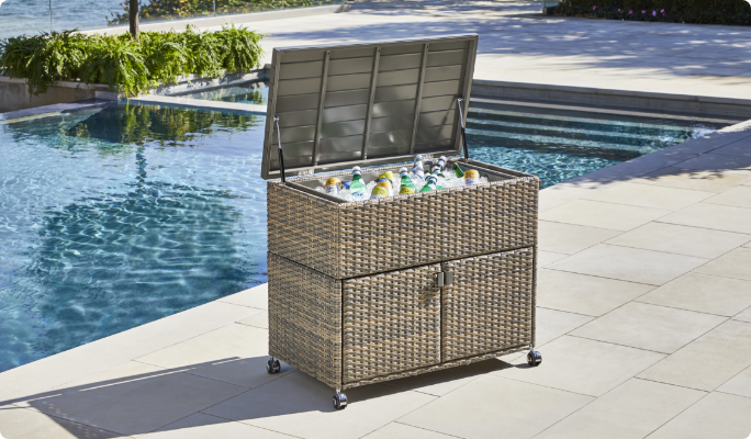 CANVAS Bala Cart opened on a poolside patio filled with beverages. 