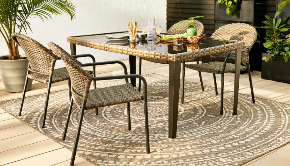 CANVAS Patio tables and chairs set up outdoors