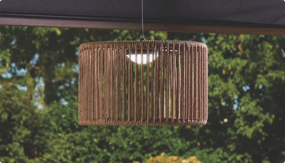 CANVAS Kostal Pendant Light hung in an outdoor gazebo.   