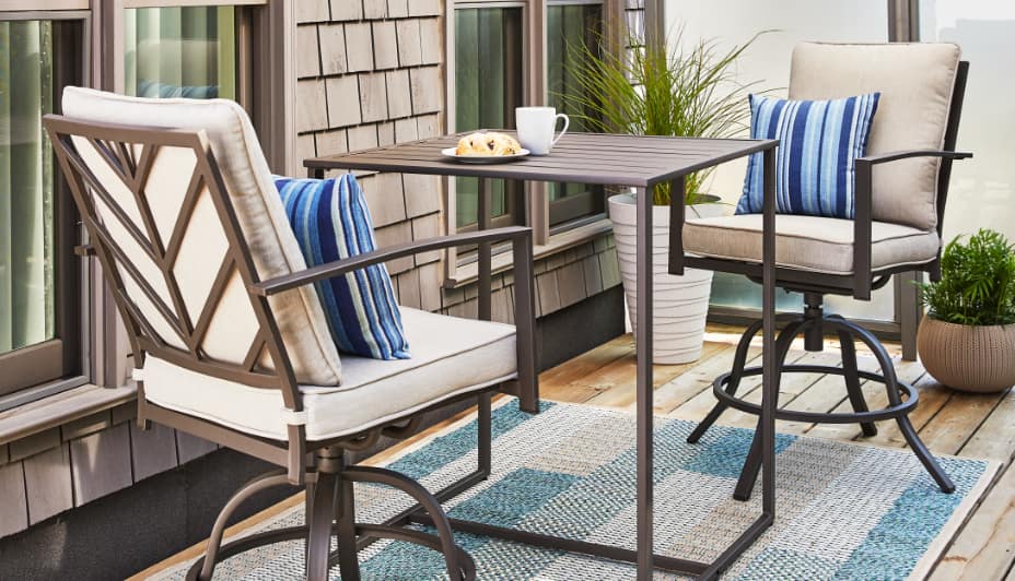 CANVAS Fairview Dining Collection set up outdoors by a house