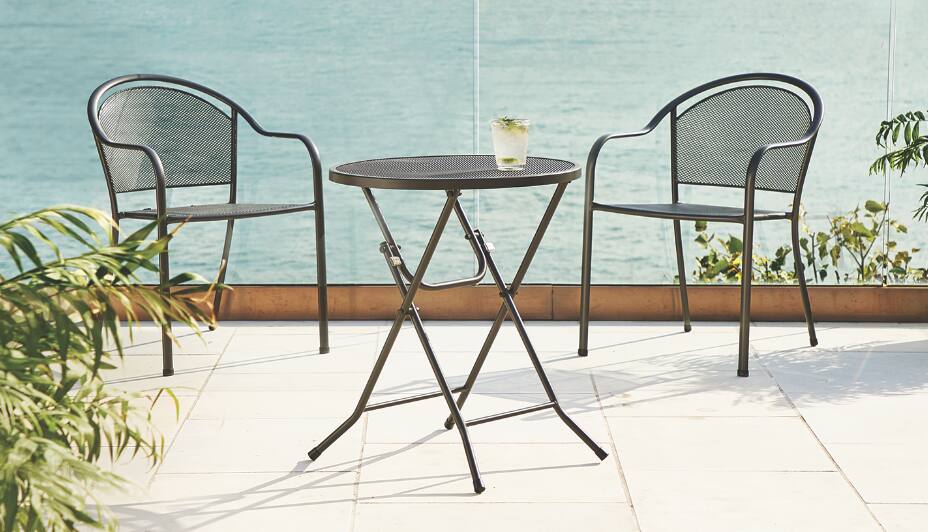 CANVAS High Park Bistro Collection on an outdoor patio facing an ocean