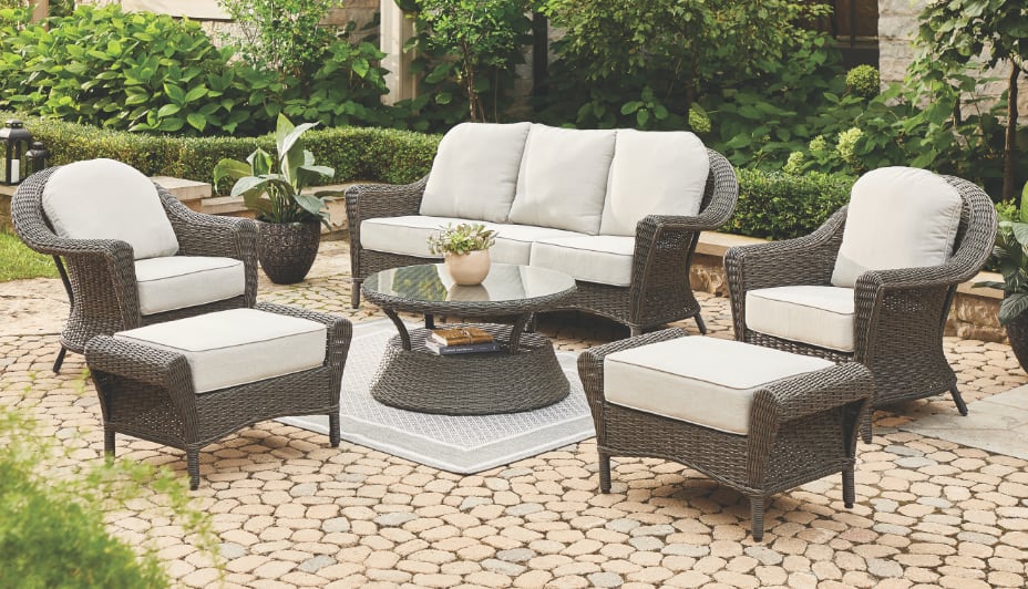 CANVAS wicket Patio sofa set with  two chairs and a table outdoors