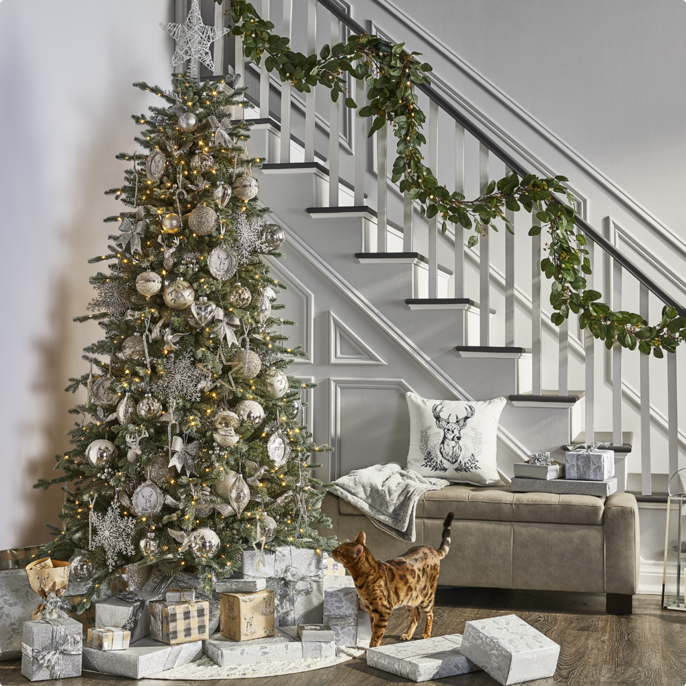 CANVAS Normandy Christmas tree with silver decorations.