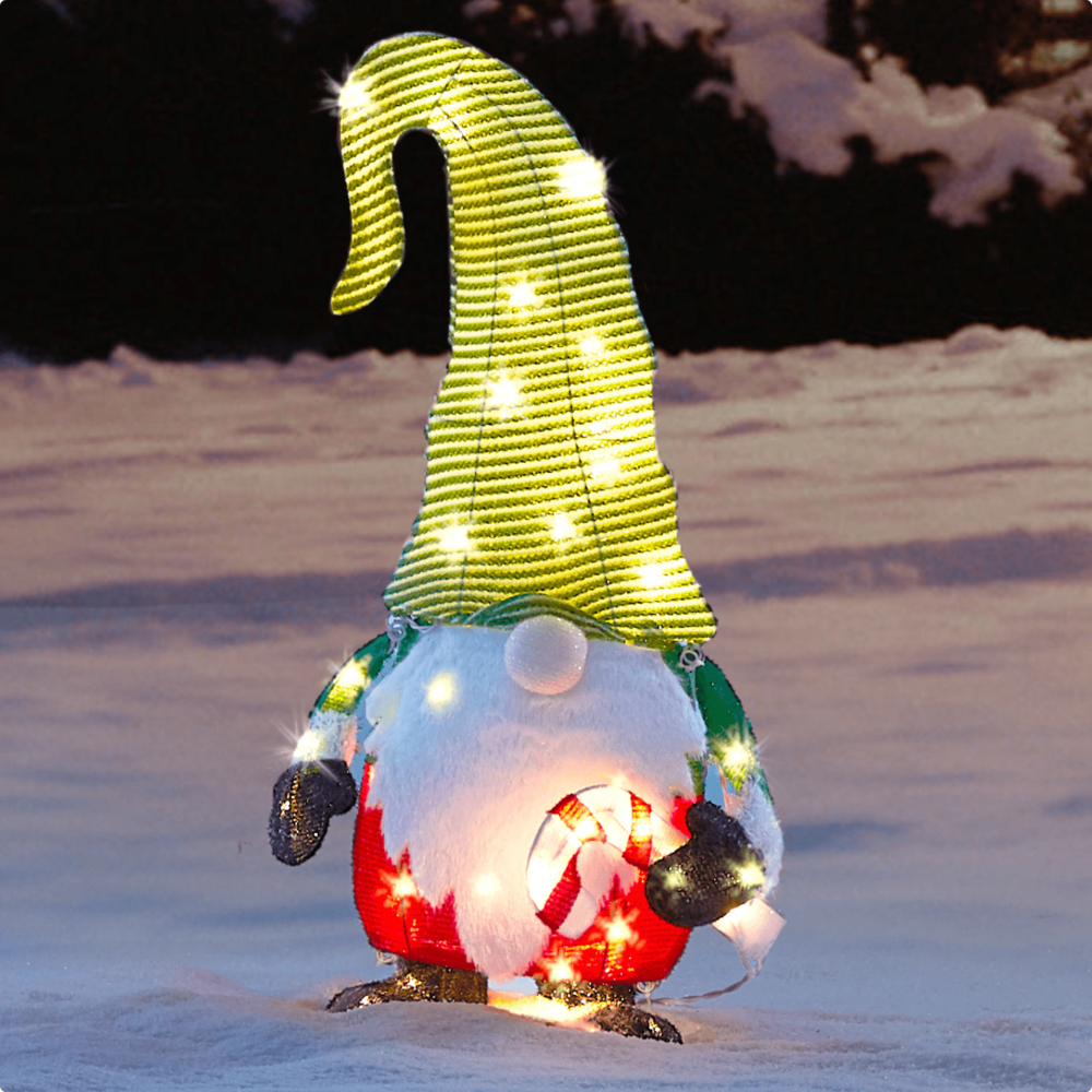 CANVAS 3-ft Whimsical LED gnome on a snowy lawn.