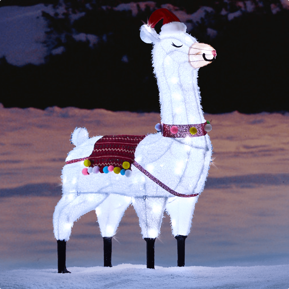 Lama à DEL CANVAS fantaisiste de 3,5 pi sur une pelouse enneigée.