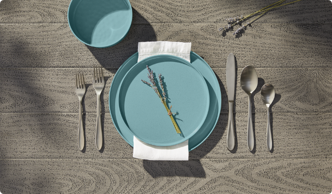 Individual table setting with blue dishware.