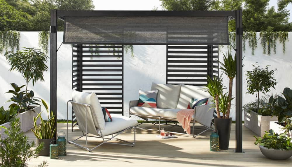 CANVAS Horizon Pergola in the Cocoon & Relax configuration with CANVAS Banks Sofa Set.