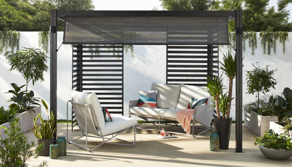 CANVAS Horizon Pergola in the Cocoon & Relax configuration with CANVAS Banks Sofa Set.