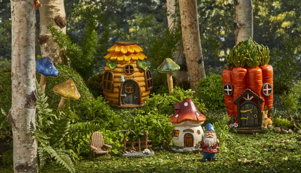 For Living Honey Bee House and Carrot House in greenery during daytime. 