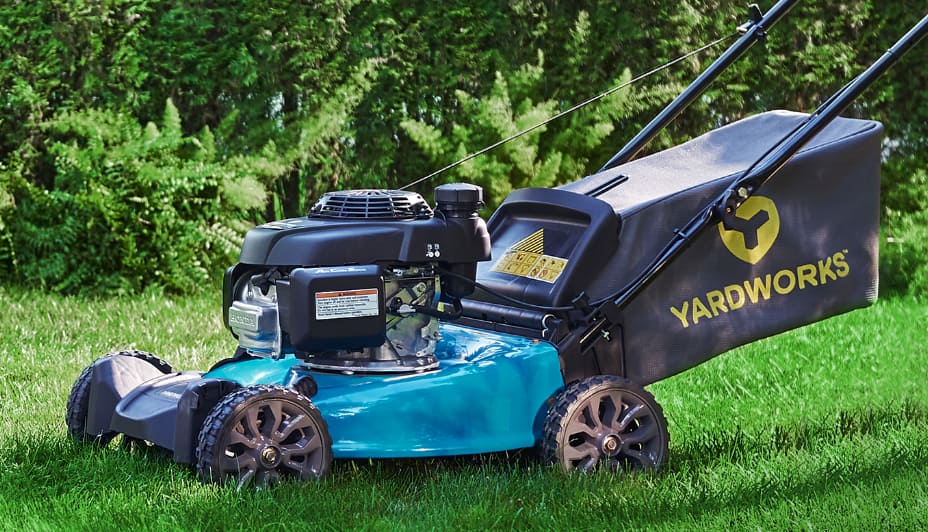 Cordless Yardworks lawn mower set on an outdoor lawn.