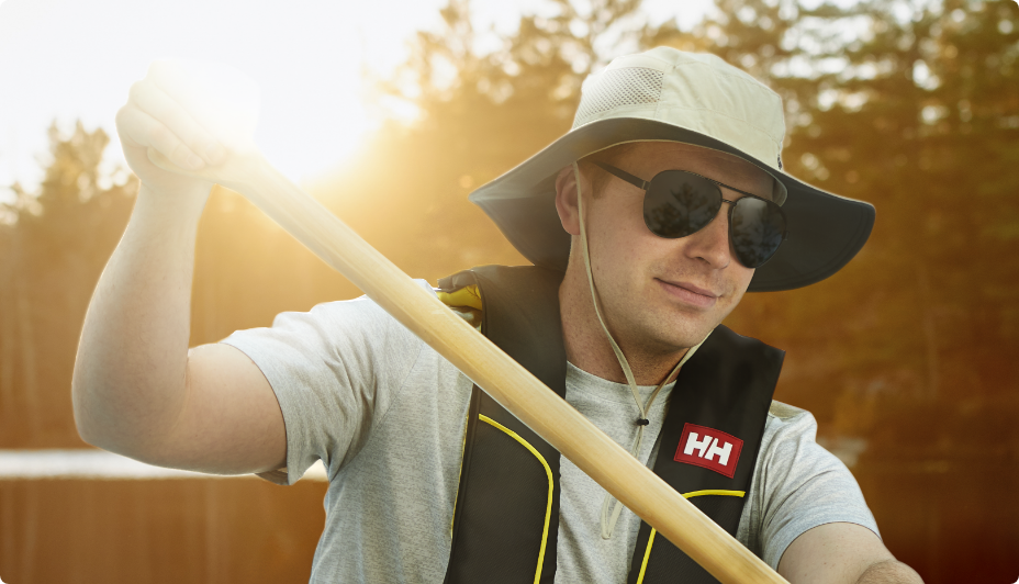 Person holding canoe paddle