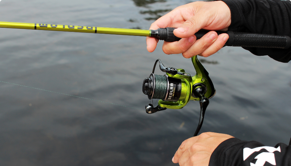 Close up of person holding a fishing rod