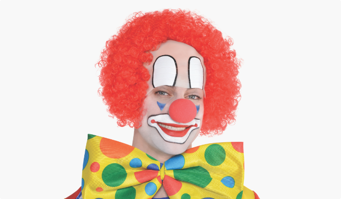 Man in clown costume with face paint.