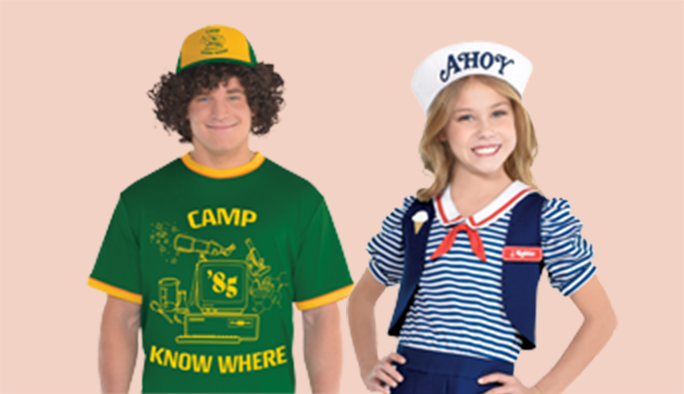 Man wearing Stranger Things Dustin costume. Girl wearing Robins Scoops Ahoy costume