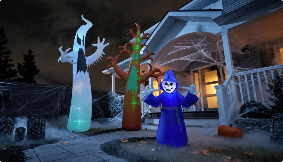  Halloween inflatables on lawn.