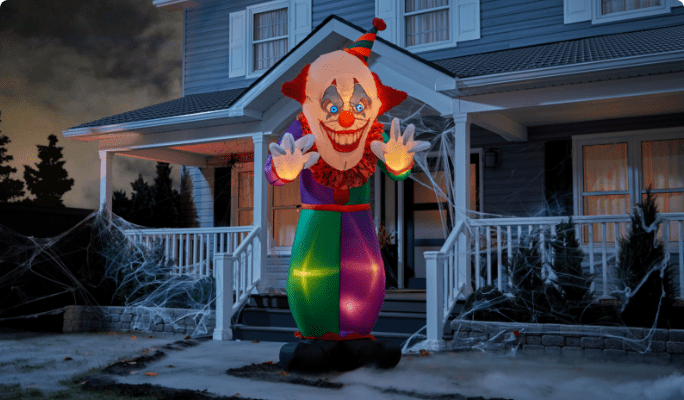 Gemmy Airblown Giant Clown on porch.