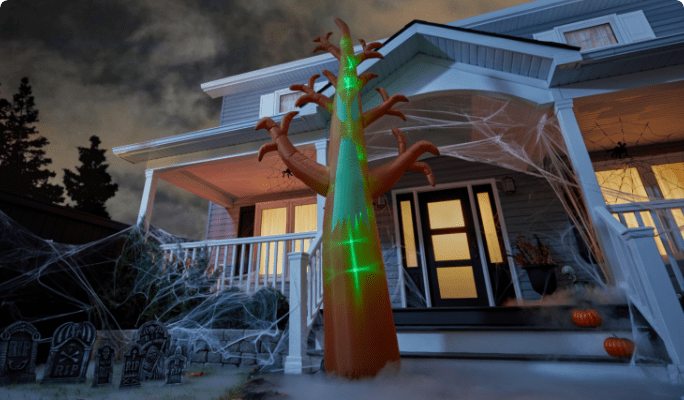 Inflatable Spooky Tree on lawn.