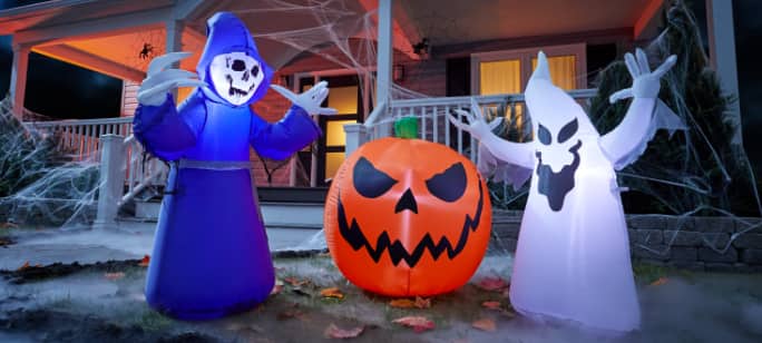 Halloween inflatables on lawn. 