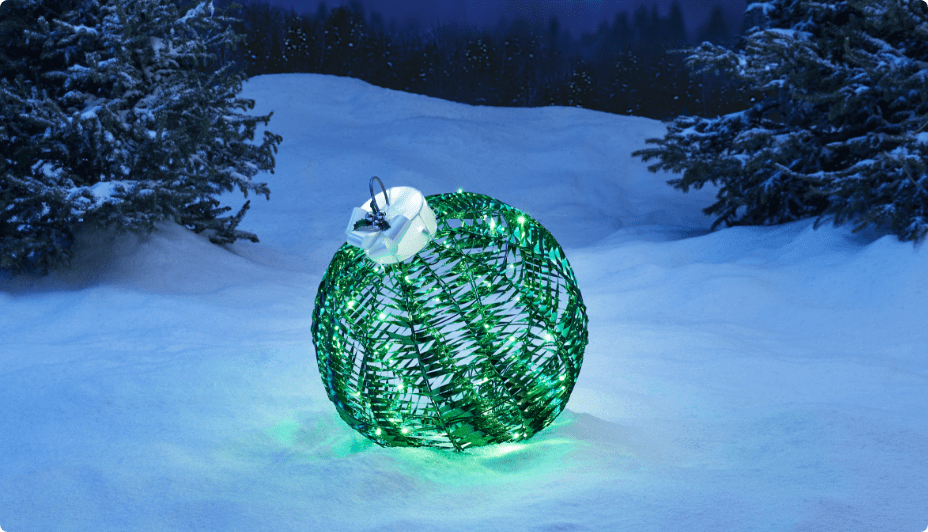 Green CANVAS LED Luminescent Ornament in snow.