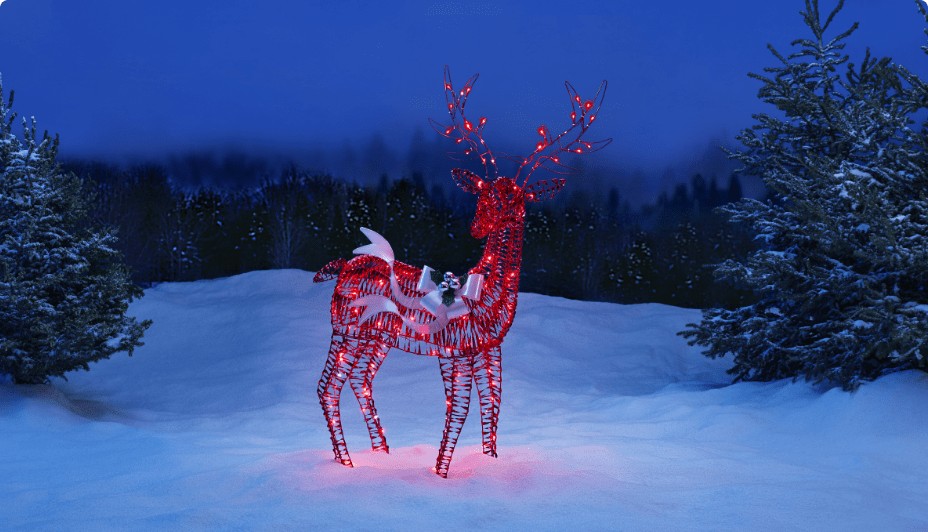 Renne rouge lumineux à DEL CANVAS dans la neige.