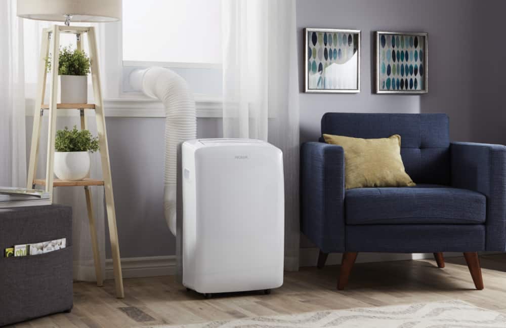 A NOMA Portable Air Conditioner in a living room setting.