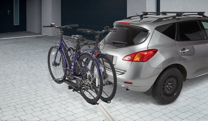  Bike rack attached to car. 