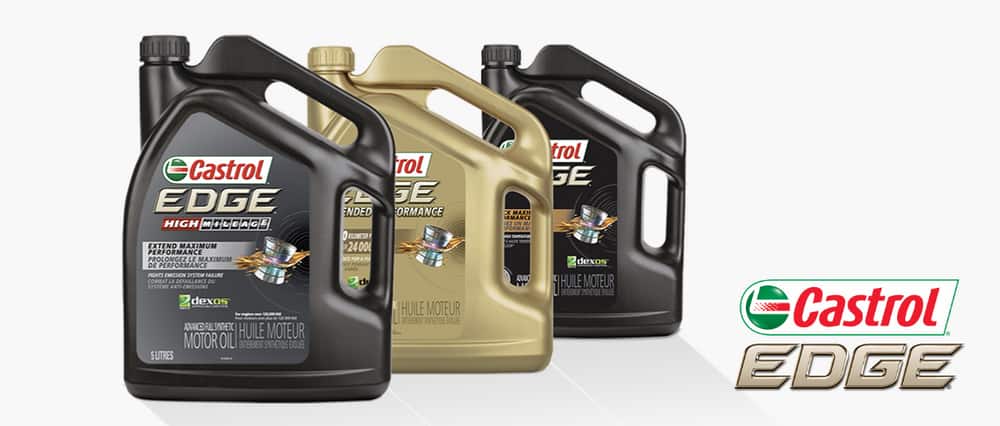 Three 5-L jugs of Castrol Edge Synthetic Oil in High Mileage, Extended Performance and regular varieties.
