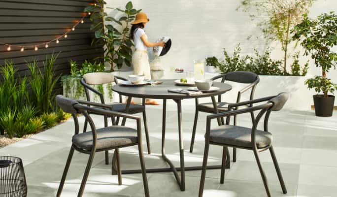 A CANVAS Trent Dining set on an outdoor patio. 