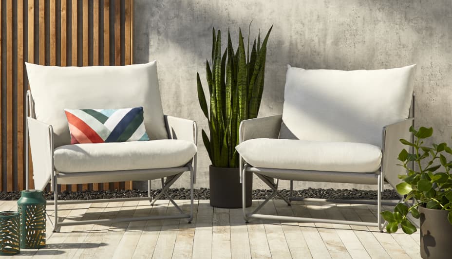 Two CANVAS Banks Buildable Sofa Seats side by side on a patio.