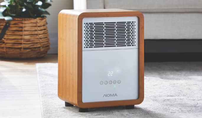 NOMA Contemporary Digital Cabinet Heater in living room