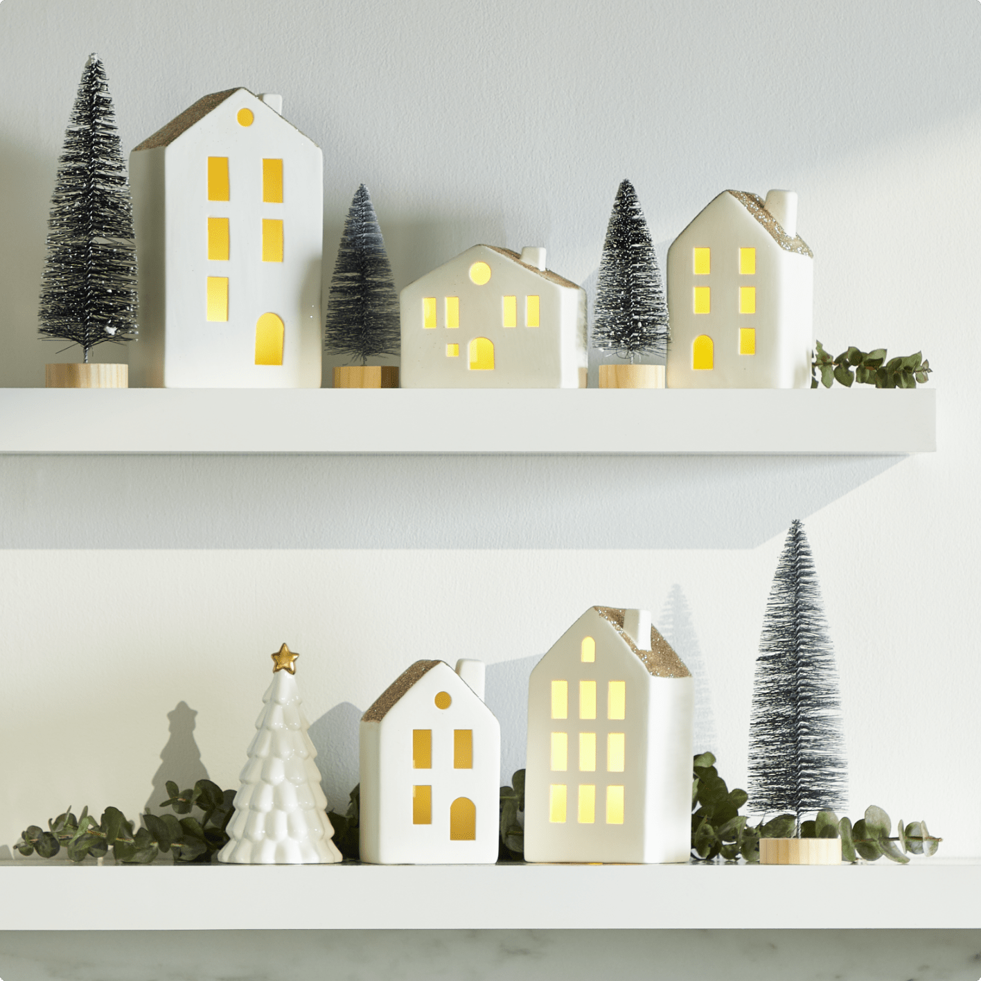 Shelves decorated with CANVAS LED Ceramic House Set