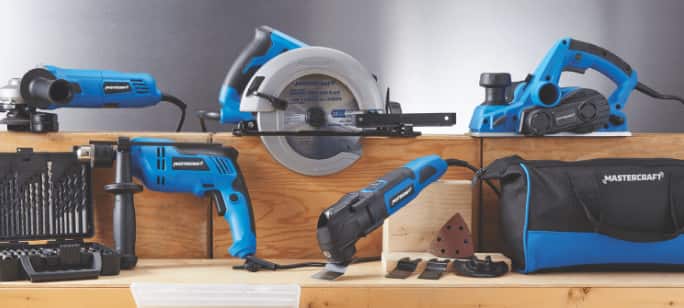 Variety of Mastercraft Power Tools on table. 