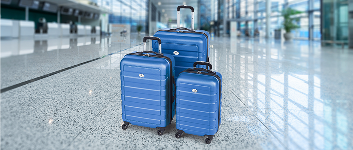 A 3-Piece set of blue Outbound hard sided suitcases.