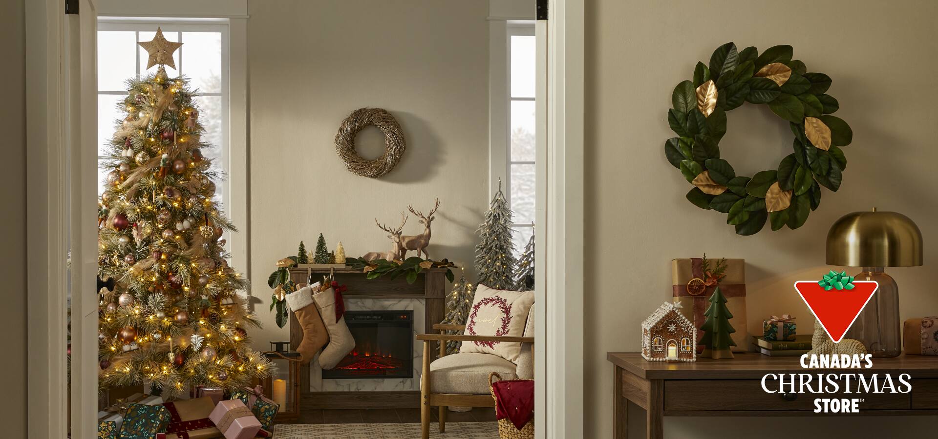 Living room decorated with Christmas tree and CANAS Christmas decorations