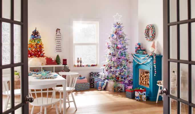 Living room decorated with CANVAS Merry & Bright Christmas decorations