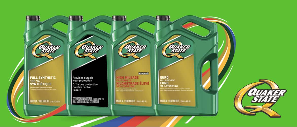 Four 5-litre jugs of Quaker State synthetic engine oil of varying grades.