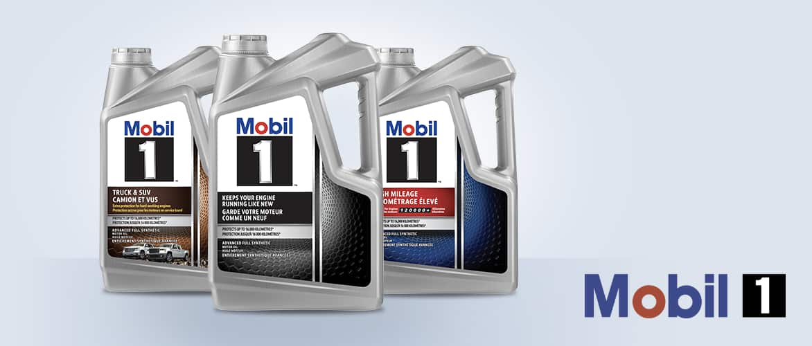 Three 4.73-L jugs of Mobil 1 synthetic motor oil of varying grades.