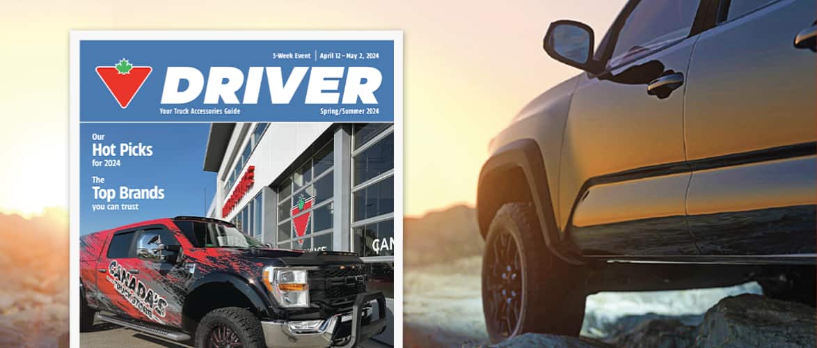 Cover image of the 2024 Driver Guide. A truck in a rugged landscape at dusk.