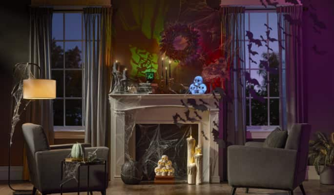 A living room decorated with Halloween decor.