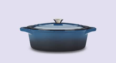 A blue MASTER Chef Cast Iron Oval Dutch Oven