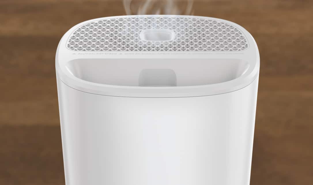 A Honeywell Ultra Comfort Cool Mist Humidifier in a bedroom.