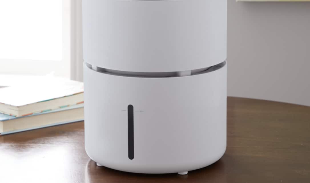 A NOMA 4-L Evaporative Humidifier on a tabletop. 
