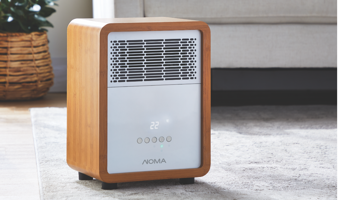 A Noma Cabinet Heater on a living room floor. 