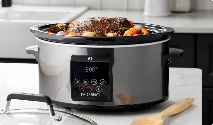 A roasted meal simmering in a PADERNO 6-Qt Slow Cooker.